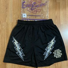 Med Eric Emmanuel Black Bolt Shorts Brand New! Size Med Will Be Shipped Day Of Purchase! Send Offers! #Ericemmanuel #Eeshorts #Ericemmanuelshorts Eric Emanuel, Eric Emanuel Shorts Outfit Women, Eric Emmanuel Shorts, Black Graphic Print Sports Shorts, Functional Black Micro-elastic Shorts, Black Bolt, Orange Shorts, Basic Shorts, Mesh Shorts