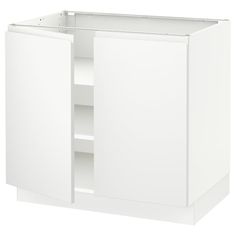 a white cabinet with two doors and one shelf on the bottom is shown in front of a white background