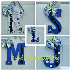 the letter m is decorated with blue and green ribbon, and it's attached to a door