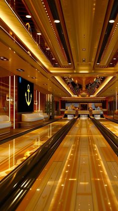 an empty bowling alley with lights on the ceiling