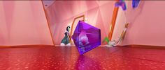 a purple object is on the floor in front of pink walls