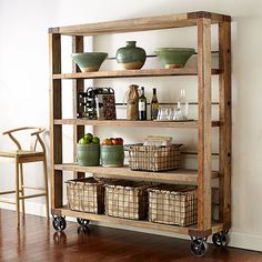 a wooden shelf with baskets and bottles on it