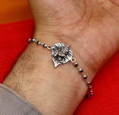 925 sterling silver handmade divine flying hanuman rakhi bracelet, This amazing silver rakhi crafted from 925 silver with immense precision. It exudes excellent craftsmanship and will surely look wonderful on your brother's wrist, buyer can be select bracelet style from option we have black basil rosary, white rosary and silver beaded bracelet for this rakhi. Metal-925 sterling silver. Item type-Rakhi Bracelet. Length-6 inches to 9 inches (select you size from option) Weight-7.50 grams.(weight w Silver Rakhi For Brother, Flying Hanuman, Braided Bracelet Diy, Black Beaded Bracelets