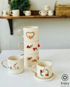 a stack of coffee cups sitting on top of a table