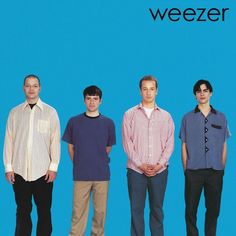 three men standing next to each other in front of a blue background with the words weezer on it