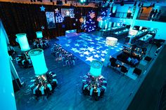 an overhead view of a dance floor decorated with blue and white stars