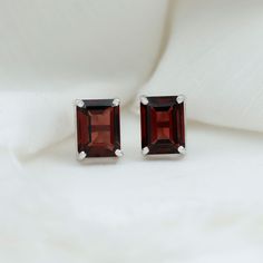 Product Details Add a hue of color when you flaunt these Stud Earrings embellished with 6X8 MM Octagon Cut Garnet Gemstone which gives you a unique look. Product Information SKU SHP-EARRINGS062016295 Length 8 mm Width 4 mm Height 4.5 mm Weight 1.44 gm GARNET INFORMATION No.of Stones 2 Pieces Total Weight 4.32 Carat Dimension(approx) Emerald Cut-6X8 mm-2 Pcs Color Red Cut Brilliant cut Shape Emerald Cut Setting Type 4-Prong-Setting Quality Grade AAA View More Cleaning Stone, Solitaire Studs, January Birthstone, Signature Jewelry, Stud Earrings For Women, Timeless Jewelry, Type 4, Garnet Gemstone, Conflict Free Diamonds