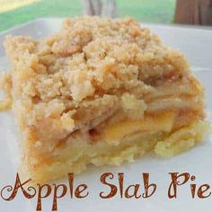 an apple slab pie on a white plate with the words apple slab pie above it