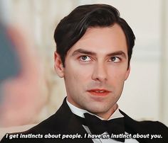 a man in a tuxedo is looking at the camera with an interesting quote