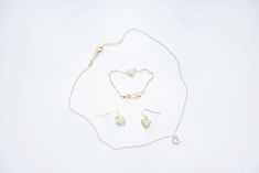 The perfect touch of sparkle to her outfit! Set includes heart pendant necklace, bracelet & earrings. Hypoallergenic. 18k plated over brass. Gold Plated Heart Cut Jewelry For Valentine's Day, Valentine's Day Adjustable Gold-plated Jewelry, Minimalist Gold Plated Jewelry With Heart Charm, Minimalist Gold-plated Jewelry With Heart Charm, Adjustable Gold Plated Heart Pendant Jewelry, Gold Plated Heart Cut Jewelry For Mother's Day, Delicate Gold Plated Heart Charm Jewelry, Elegant Heart Shaped Jewelry Set For Mother's Day, Delicate Gold-plated Heart Charm Jewelry