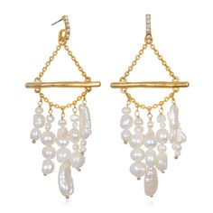 The Paulette Pearl Chandelier Earrings offer soft movement courtesy of the organic-shaped freshwater pearls swaying off delicate chains. A statement that’s sure to turn heads, this lovely pair is perfect for day or night styling. Dangle Earrings With Baroque Pearl Chain, Elegant Pearl Dangle Chandelier Earrings, Elegant Teardrop Pearl Earrings With Dangling Beads, Elegant Pearl Charm Chandelier Earrings, Pearl Charm Dangle Chandelier Earrings, Pearl Dangle Chandelier Earrings With Pearl Charm, Elegant Pearl Charm Chandelier Dangle Earrings, Elegant Pearl Chandelier Dangle Earrings, Dangle Chandelier Earrings With Pearl Charm