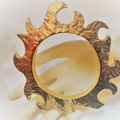 Vintage Christian Lacroix Prototype Runway Cutout Sun Rigid Gilt Bangle Bracelet Circa 1990s. Signed. Excellent Condition. Made In France Dramatic Gilt Bracelet. Fits A Small To Small/Medium Sized Hand. Approximate Measurements Along Interior: 2.60" Inner Diameter Opening. The Rich 18k Gold Plating Is Pristine. Matching Choker And Earrings Also Available. A Gorgeous And Important Addition To Any Serious Collection Of This Design Titan If You Have Any Questions, Please Contact Me. Thank You. Christian Lacroix Jewelry, Sun Bracelet, Christian Lacroix, Gold Plating, Bangle Bracelet, Womens Jewelry Bracelets, Made In France, Bangle Bracelets, Choker