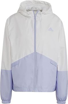 adidas Adidas Women's Essentials Windbreaker Size XS or Large White/Violet Style # H07844 A HOODED WINDBREAKER WITH SOME EXTRA ROOM. Big is better. This adidas oversize windbreaker helps keep things smooth during blustery weather. Clean adidas detailing and blocks of colour make styling with this windbreaker a breeze. This product is made with Primegreen, a series of high-performance recycled materials. Oversize fit Full zip with high collar 100% recycled polyester plain weave Side slip-in pocke White Cotton Windbreaker With Adjustable Hood, White Adidas Windbreaker For Outdoor Activities, Adidas White Windbreaker For Outdoor Activities, White Adidas Hooded Windbreaker, White Hooded Adidas Windbreaker, White Cotton Windbreaker With Drawstring Hood, White Adidas Windbreaker For Spring, White Adidas Windbreaker For Outdoor, Adidas White Windbreaker For Outdoor