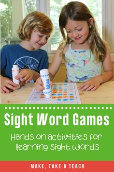 two young children playing with phonics games