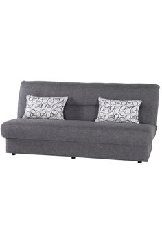 a gray couch with two pillows on it's back and one pillow in the middle