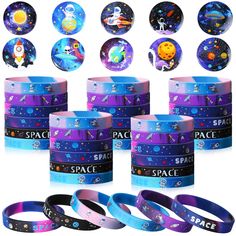 the space bracelets are all different colors and sizes, with various designs on them