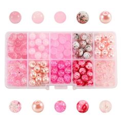 pink and white beads are in a plastic container with different shapes, sizes and colors