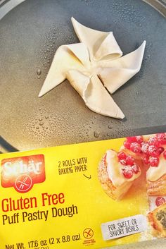 a box of gluten free puff pastry dough sitting on top of a pan