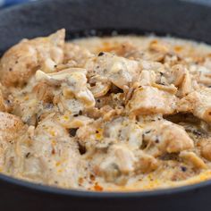 a close up of food in a pan on a table