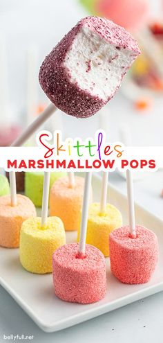 marshmallow pops on a white plate with the title text skittles marshmallow pops