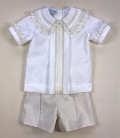 This beautiful, handmade boys' ensemble is perfect for any occasion! This listing is for one Heirloom Shirt and Short set. This little boy ensemble has a custom look with a front pleat, with entredeux and a lace insertion center panel.  The hang-out shirt has an heirloom collar and cuffs with a pearl button back closure. The pull-on shorts are made using a cotton southern linen fabric pleated with front band and elastic back. Shirt is made with white Pima cotton with ecru French Val lace center Classic Collared Sets For Spring, Elegant Fitted Sets With Pintucks, Classic Spring Sets With Collared Shape, Classic White Collared Sets, Classic Cream Summer Sets, Lace Insertion, Back Shirt, Heirloom Sewing, Baby Gown