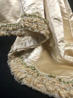 "Museum Deaccession: Beautiful and rare ladies Historical Wedding Ensemble dated to the early 1890s in great condition. As you can see from the photos, it presents quite well. Hand made in New York by A F Jammes with fine couture detailing for a Miss EB Jennings. (hand written on a sewn in piece of silk) Both pieces are 100% Silk Duchess Satin in a Golden Champagne color Fitted Bodice: Falls to natural waist at sides but dips down in the front and back High neck bodice trimmed down the front wit Historical Baroque Wedding Dress, Victorian Ceremonial Dress With Historical Design, Victorian Wedding Dress With Historical Design, Vintage Baroque Victorian Dress For Formal Occasions, Ceremonial Vintage Victorian Dress, Traditional Fitted Victorian Wedding Dress, Fitted Traditional Victorian Wedding Dress, Victorian Baroque Style Wedding Dress, Historical Baroque Victorian Wedding Dress