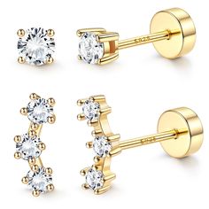 three pairs of gold tone stud earrings with cubics on each side and an earring