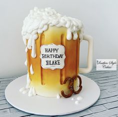 a birthday cake made to look like a beer mug