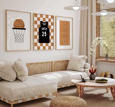 a living room filled with furniture and pictures hanging on the wall above a coffee table