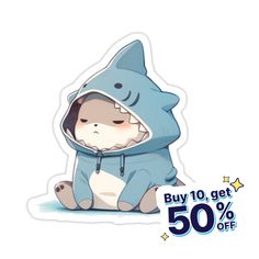 a sticker with a cartoon shark wearing a hoodie and sitting on the ground