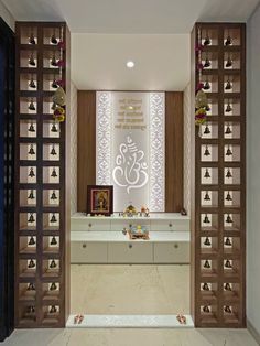 an open door leading into a room with white walls and wooden doors, decorated with intricate designs