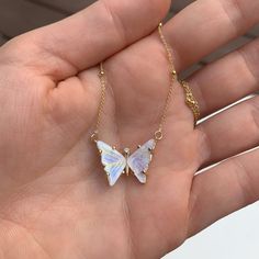 This handmade, butterfly necklace symbolizes your rebirth and the next chapter in your story. It's time to start something new and trust the magic of new beginnings. Embrace the beauty of your own transformation and let go of the past.DETAILS- One-of-a-kind butterfly- Crafted with 14k yellow solid gold- Natural, genuine moonstone- Diamond- Chain style may vary slightly- Handmade in New YorkIn natural stones, color variations and natural imperfections are common and make each stone rare and uniqu Handmade Spiritual Butterfly Necklace, Ethereal Handmade White Necklace, Handmade Ethereal White Necklace, Handmade White Ethereal Necklace, White Ethereal Jewelry For Gifts, White Delicate Jewelry Gift, Unique Butterfly Charm Pendant Necklace, Unique Pendant Necklace With Butterfly Charm, Ethereal Gemstone Necklace For Gift