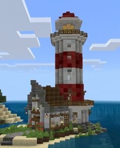 a red and white lighthouse sitting on top of a small island