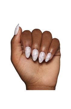 What it is: A natural, semitransparent white base has silver three-dimensional swirls that give holiday vibes to these short, almond shaped press-on nails.What it does: You can never go wrong with the classic short-almond shape. Each wear lasts up to two weeks.Set includes: - 30 nails in 15 inclusive sizes- Nail glue (0.07 oz.)- Double sided nail file- Cuticle stick- Alcohol pad $20 Value Imported 30 Nails, Short Almond, Nails Set, Holiday Vibes, Almond Shape, Almond Shaped, Nail Glue, Silent Night, Nail File