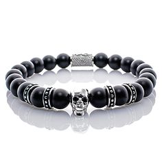 Onyx Beads Black Matt Silver Skull 4 Crown Women's/ men's bracelet Handmade onyx beaded bracelet with a platinum plated skull. Rounded off by four intermediate elements and a beautiful engraved cylinder. All elements are made of stainless steel. The striking design and high-quality workmanship as well as our branded stainless steel cylinder back piece with our logo make the bracelet an unmistakable piece of jewelry. * Premium onyx beads Ø 8 mm * High quality * Branded back piece *Made in Germany Black Skull Stainless Steel Jewelry, Black Stainless Steel Skull Jewelry, Silver Onyx Bracelets With 8mm Beads, Adjustable Black Stainless Steel Charm Bracelet, Silver Onyx Beaded Bracelets With 8mm Beads, Black Stainless Steel Jewelry With Round Beads, Adjustable Silver Skull Beaded Bracelets, Adjustable Silver Beaded Skull Bracelets, Skull Shaped 8mm Bead Jewelry Gift