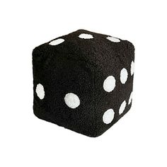 a black dice with white dots on it