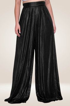 These black palazzo pants are the perfect fashion statement for a night out! Steal the spotlight in these beautiful high-waisted Palazzo Pants. They are made of a luxurious metallic fabric, a hidden zipper on the side, and feature a wide leg silhouette. These plus size palazzo pants are perfect for any occasion. Wear them to work, to a party, or to the grocery store, these pants will never let you down. The metallic finish is flattering on any skin tone and will never go out of style. team them with a matching silver crop top and heels for the total look Update your wardrobe with these black wide leg pants. Featuring a metallic material, a back hidden zipper, and a wide-leg fit, team them with a matching silver crop top and heels for the total look Metallic Shimmer Detail Wide Leg Pants Ba Plus Size Palazzo Pants, Plus Size Palazzo, Silver Crop Top, High Waisted Palazzo Pants, Black Palazzo Pants, Maxi Tops, Black Wide Leg Pants, Party Kleidung, Sweater Crop