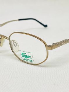 Glasses preserved with original demo lenses, 90s. ■Brand: Lacoste ■Model: 7207 ■May have slight signs due to storage ■With non-original soft case Vintage glasses from the 90's, with demo lens. ■Brand: Lacoste ■Model: 7207 ■There may be slight marks due to storage ■Comes with not original soft case Vintage Lacoste, Glasses Vintage, Vintage Glasses, Eyewear Sunglasses, Sunglasses Accessories, Lenses, Etsy Accessories, Accessory Gift, Gift Card