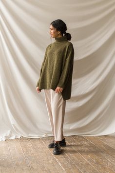 Our classic boucle knit jumper, with a roll neck and made from a 60% wool mix; perfect for layering in the chillier months. Features a flecked detail to the knit, an unbalanced hemline, dropped shoulder sleeves and a small Olive tab stitched to one side of the seam. The boucle is boxy in cut and is made for a relaxed and slouchy fit. Cashmere Outfits, Muslim Fashion Hijab, Minimalist Wardrobe, Mood Board Fashion, Cold Weather Outfits, Casual Chic Outfit