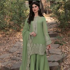 Color: Green Fabric: Cotton Net Work Details: Machine Embroidery Shirt: Embroidered Cotton Net Inner Slip: Viscose Silk Pants: Silk Dupatta: Embroidered Cotton Net Pakistani Gharara, Embroidery Shirt, Shirt Embroidery, Silk Dupatta, Silk Pants, Green Fabric, Fabric Cotton, Machine Embroidery, Silk