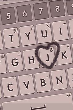 a keyboard with a heart drawn on it