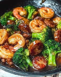 shrimp, broccoli and sausage in a skillet