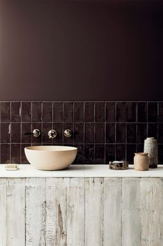 a bathroom sink sitting on top of a counter