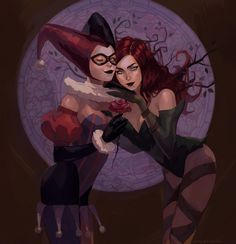 two women dressed as witches hugging each other