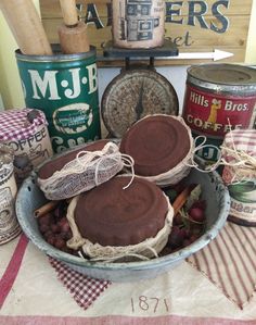 a bowl filled with lots of food on top of a table next to other items