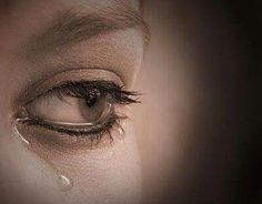 a woman's eye with tears on it and the words tears are liquid love