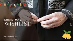 a man in a black suit with christmas lights on his lapel and the words, christmas wishlist read more