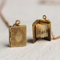 Hey, I found this really awesome Etsy listing at https://www.etsy.com/listing/520083467/personalized-book-locket-necklace-with Book Locket Necklace, Engraved Locket, Silk Purse, Personalized Book, Book Locket, Gold Engraving, Secret Messages, Proposal Gifts, Bookish Gifts