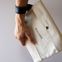 W Clutch ''Monk" SILVER の画像一覧｜Creema(クリーマ) ハンドメイド・手作り・クラフト作品の販売サイト Canvas Shopper Bag, Baby Products Packaging, Shirt Packaging, Unique Tote Bag, Delivery Bag, Clothing Packaging, Graphic Design Business, Bracelets Handmade Diy, Diy Plant Hanger