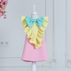 This girl's dress is a dress that will make your toddler & baby girl look the cutest in the living room with its stylish design. Produced with love and care by Loli Baby Styles🤗 . You can make your little angel look glamorous at parties, Christmas, birthdays, weddings and special occasions😍.  🎁You can give a gift to your own angel or your loved ones with peace of mind. Thanks to the 100% cotton lining, your baby girl can move freely. First-class fabric has been used 💃 💯 FABRIC Body; Scuba F Multicolor Ruffled Dress For Easter, Multicolor Ruffled Easter Dresses, Fitted Dress For Easter Party, Playful Princess Dress With Ruffles For Party, Pink Sleeveless Easter Dress, Multicolor Ruffled Princess Dress For First Birthday, Playful Yellow Party Dress, Playful Pink Dress With Bow, Fitted Multicolor Dress For First Birthday